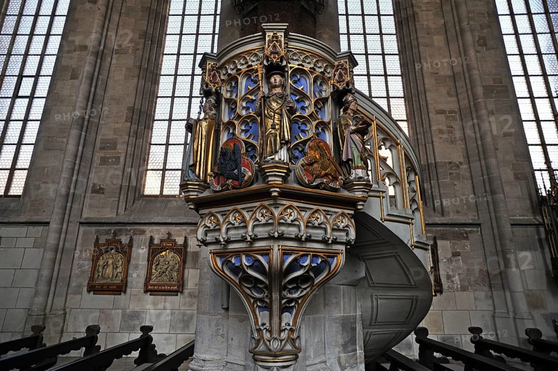 Ornate sandstone pulpit with tracery