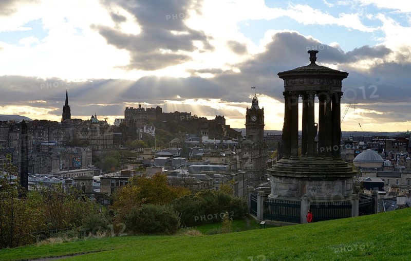 View from Calton Hill with the Dugald Stewart Monument on the Edinburgh Castle and the historic city center