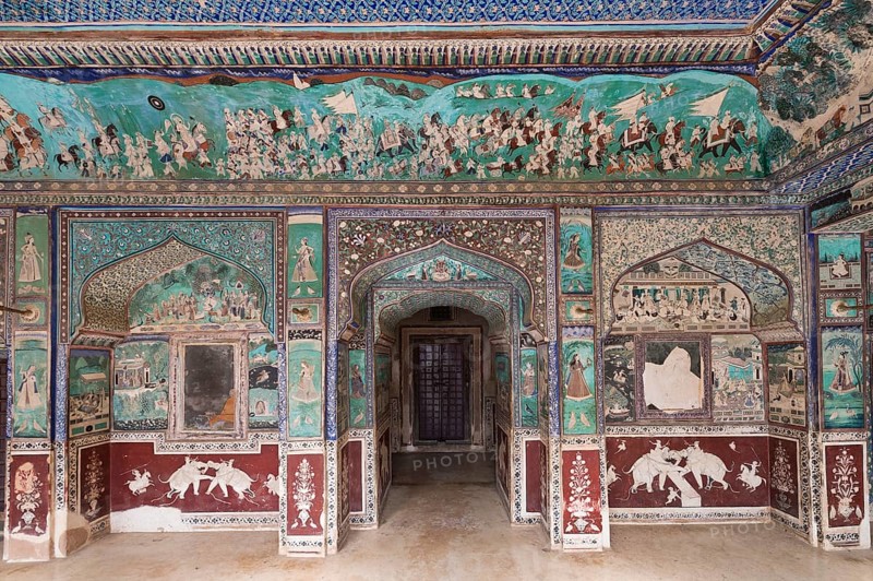 Wall paintings or frescoes painted with natural colours from the Bundikalam school of painting