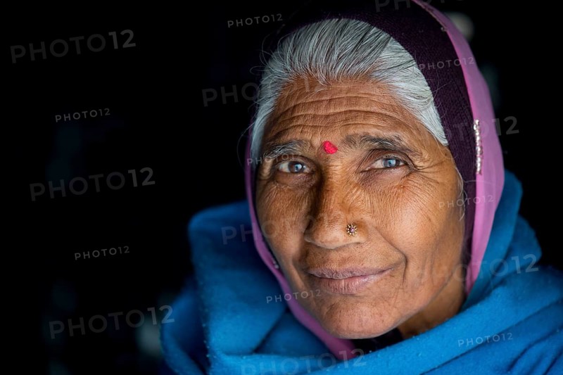 Mature woman with red bindi on her forehead