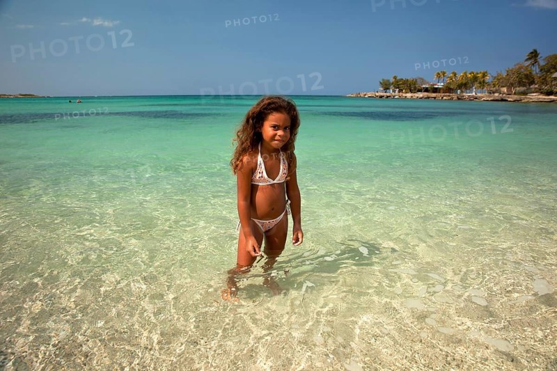 Little Cuban girl on Playa Bacuranao beach