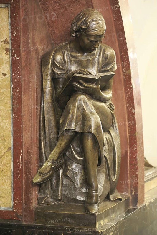 Bronze statue of a female student