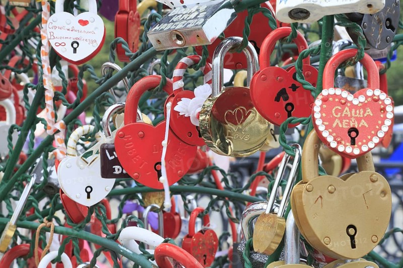 Metal trees with lovers' padlocks attached on Luzkow Bridge