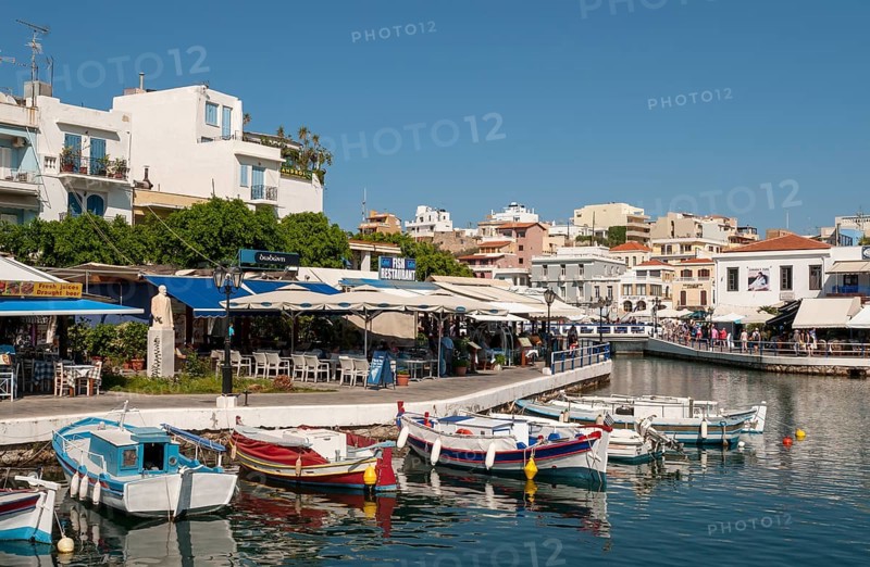 Fishing boats and restaurants on lake Voulismeni
