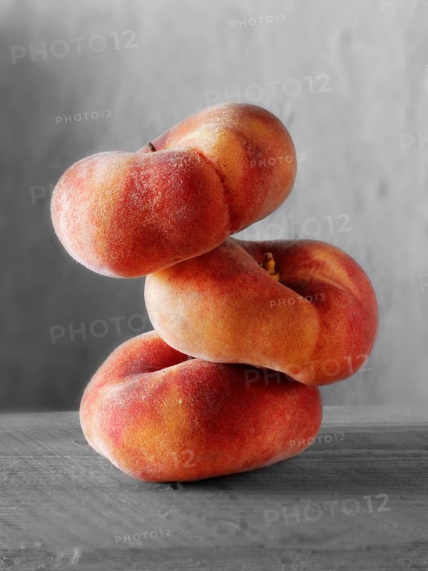 Donut peaches piled on top of each other
