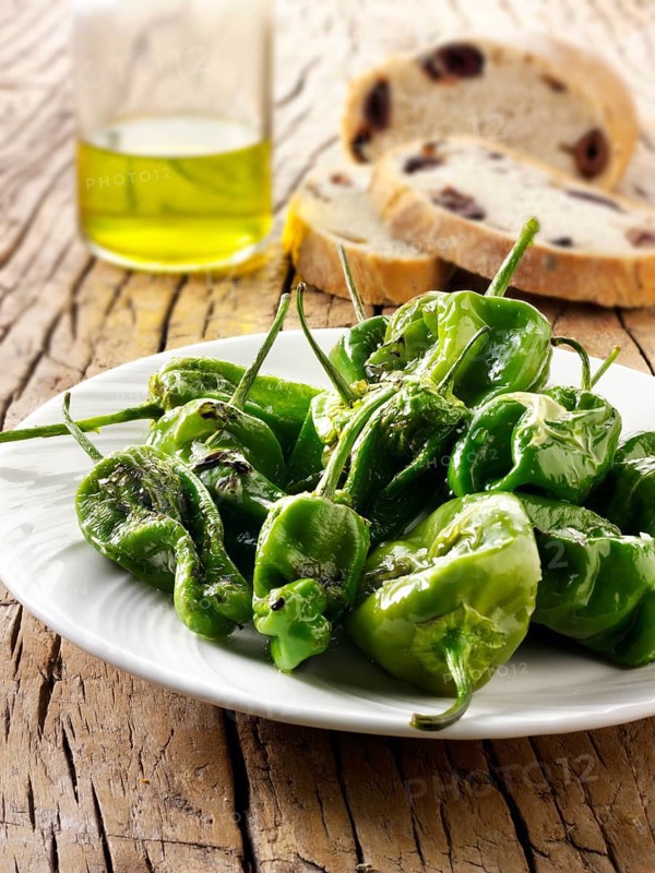 Whole griddled Padron peppers with sea salt
