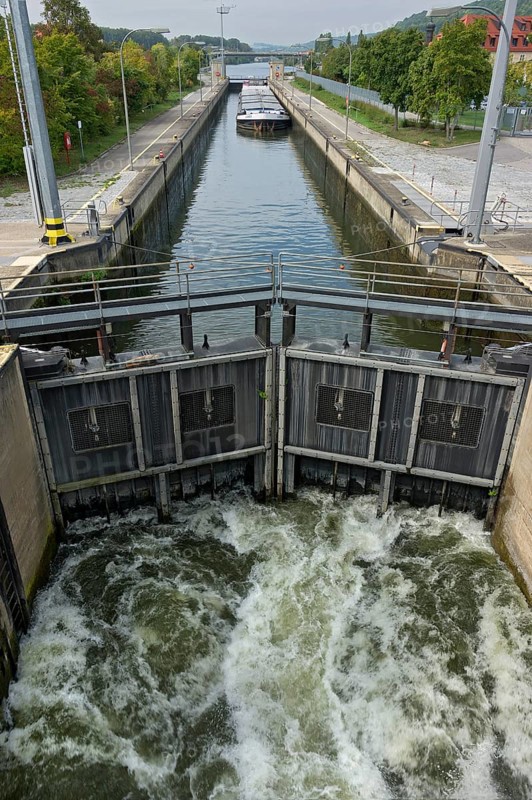 Cargo ship being lowered into a sluice