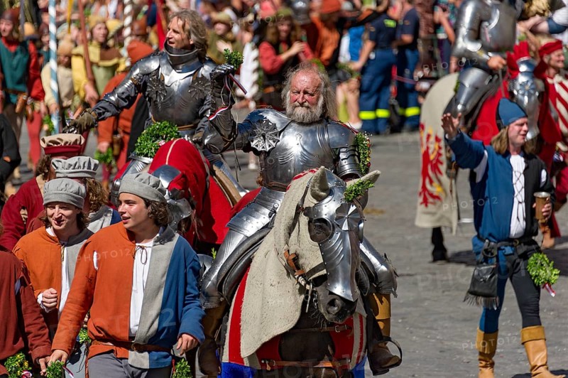 Knights wearing armour on horseback