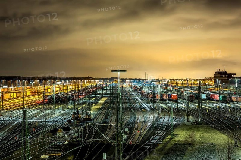 Parked goods wagons on the tracks of the Maschen marshalling yard at night