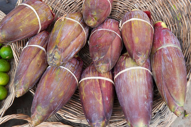 Banana flowers for sale at a market