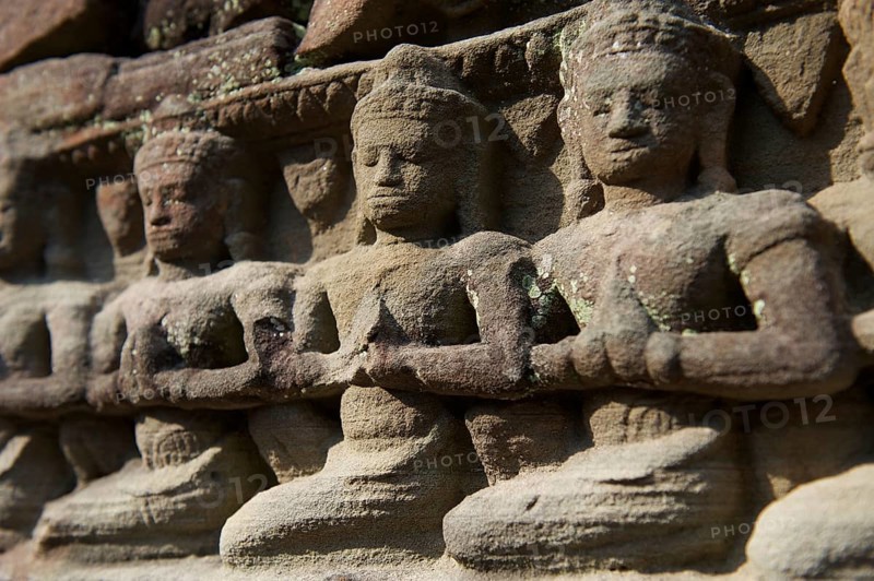 Stone figures on the Buddhist temple of Ta Som