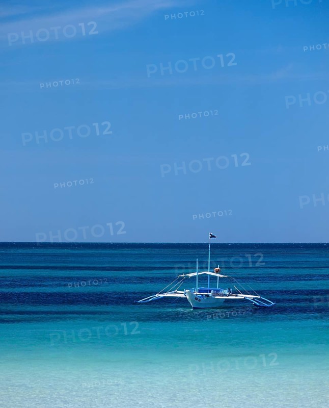 Banka or outrigger boat on the sea