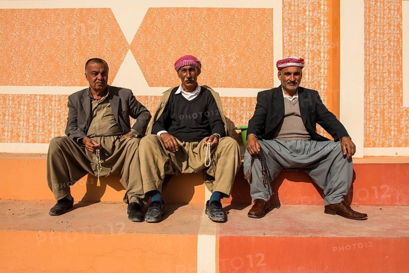 Meeting of elderly Kurdish men