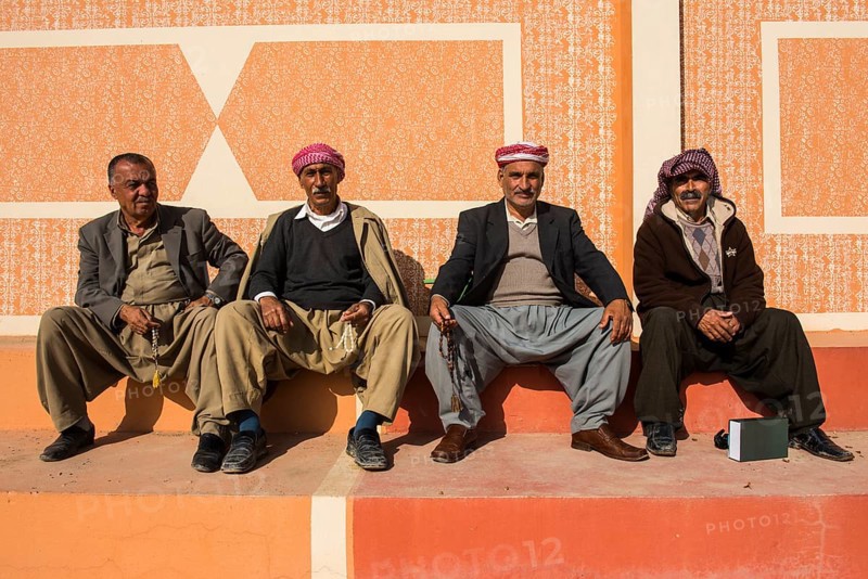 Meeting of elderly Kurdish men