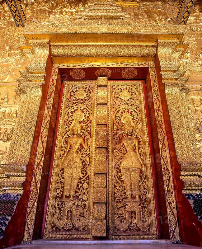 Gilded entrance doors of Wat Mai Temple