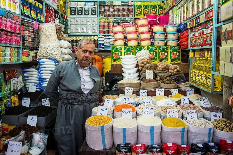 Vendor in his stall in the bazaar of Sulaymaniyah