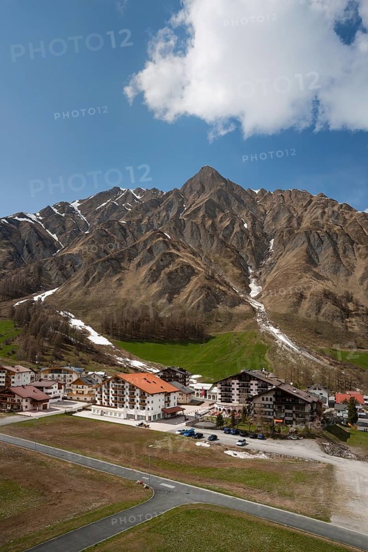 View of the village of Samnaun with Mt Piz Ot