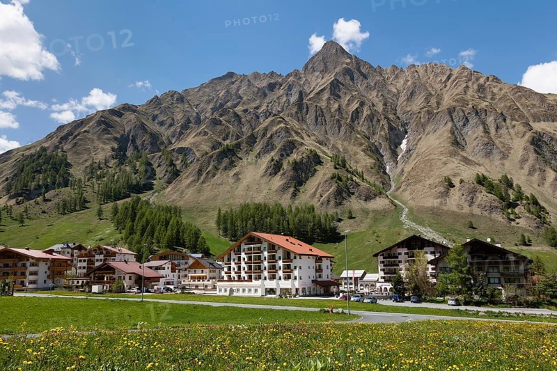 View of the village of Samnaun with Mt Piz Ot