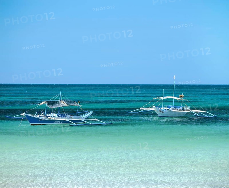 Two Bankas or outrigger boats on the sea