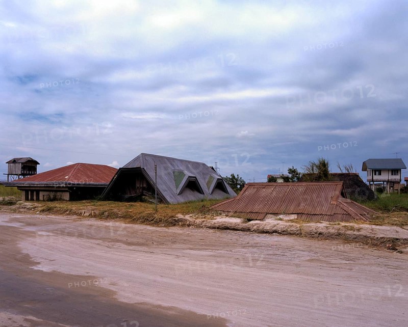 Buried houses and a school in Porac