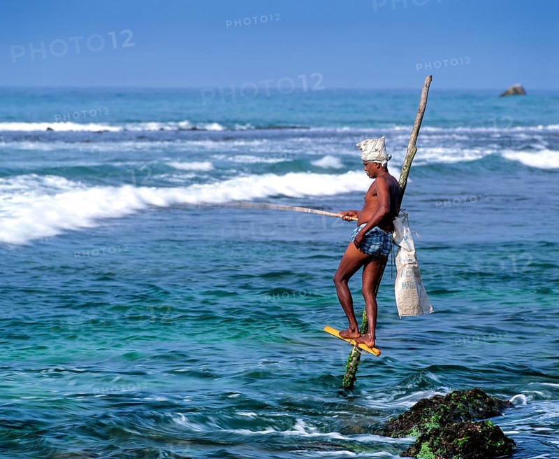 Stilt fisherman