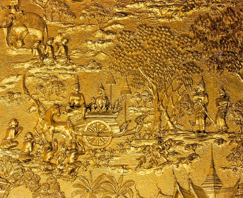 Gilded relief on the facade of Wat Mai Temple