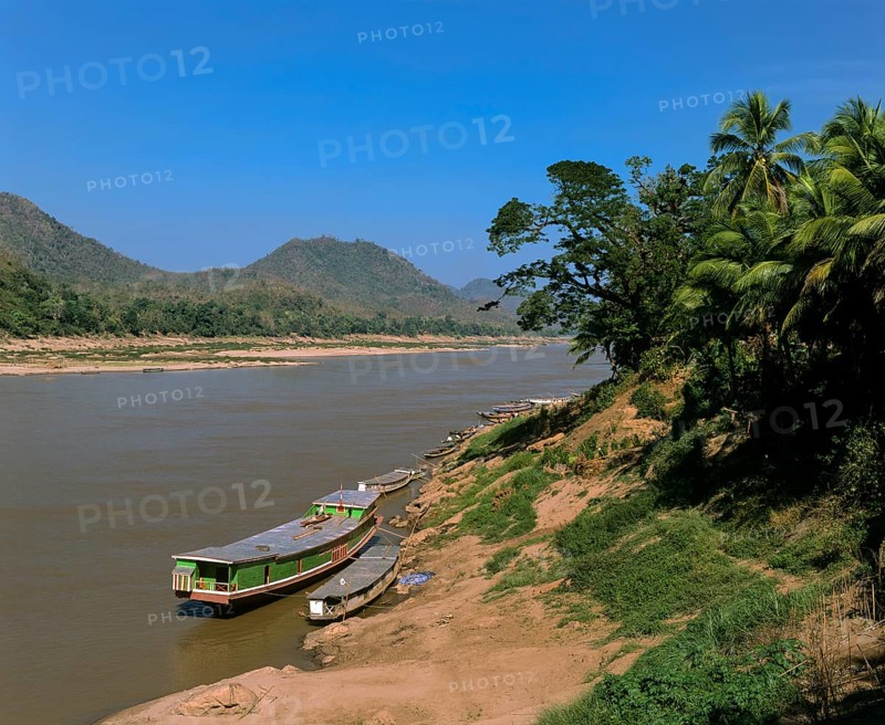 Boats on the shore of the Mekong River