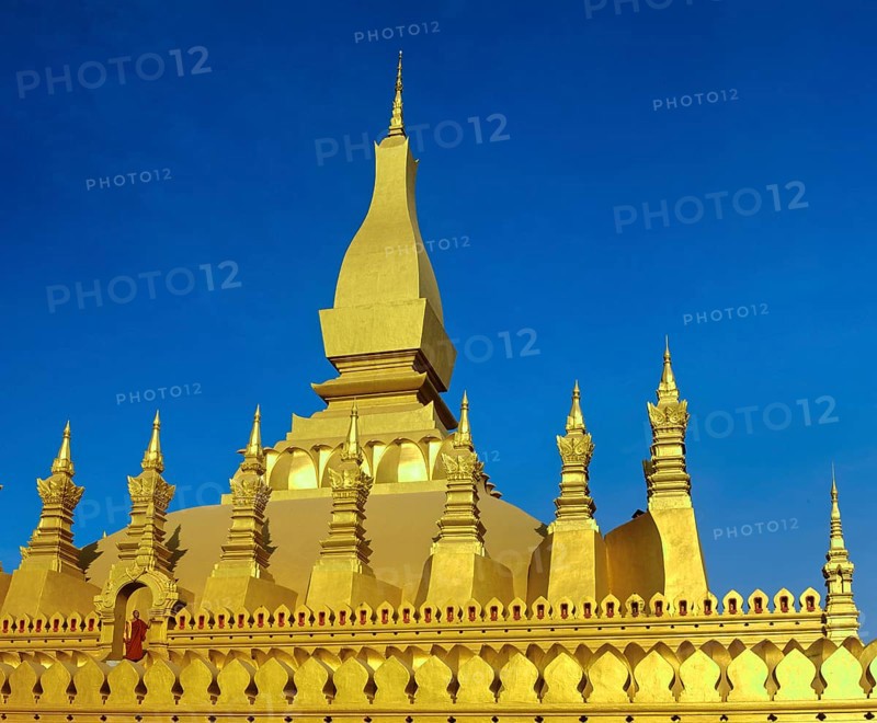 Monk on the terrace of Phra That Luang