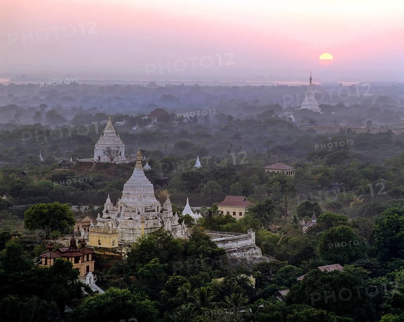 View from Sagaing Hill over pagodas at sunset