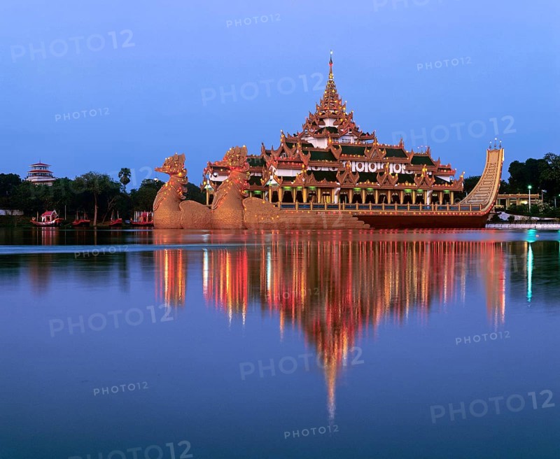 Karaweik ship restaurant on Lake Kandawgyi at dusk