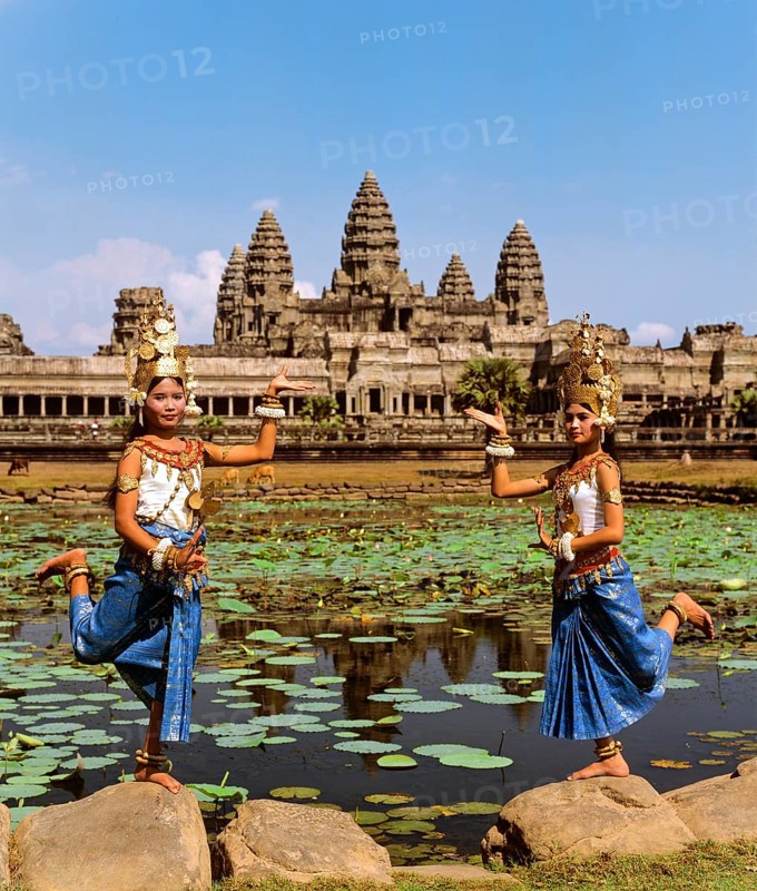 Temple dancers or apsaras at the Lotus Pond in front of the temple of Angkor Wat