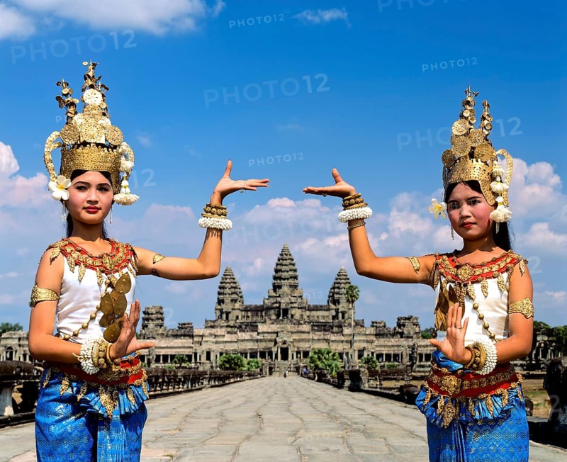 Temple dancers or apsaras on the western promenade in front of the temple of Angkor Wat