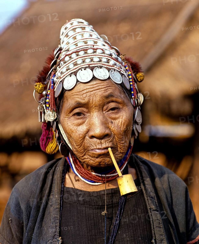 Akha woman with a pipe