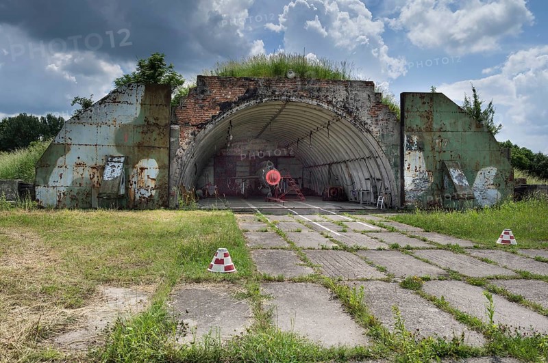 Hangar with a MIG-21 SMT aircraft