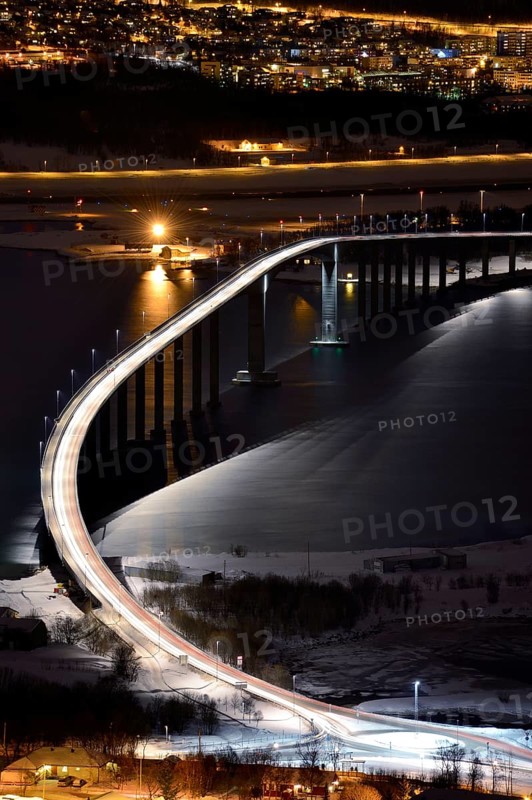 Bridge over fjord at night