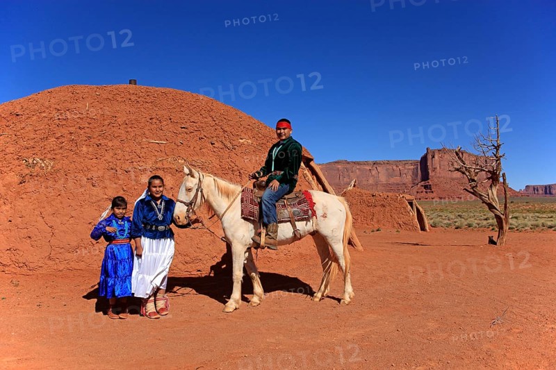 Navajo Indian family with a horse