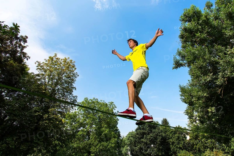 Athlete balancing on a slackline