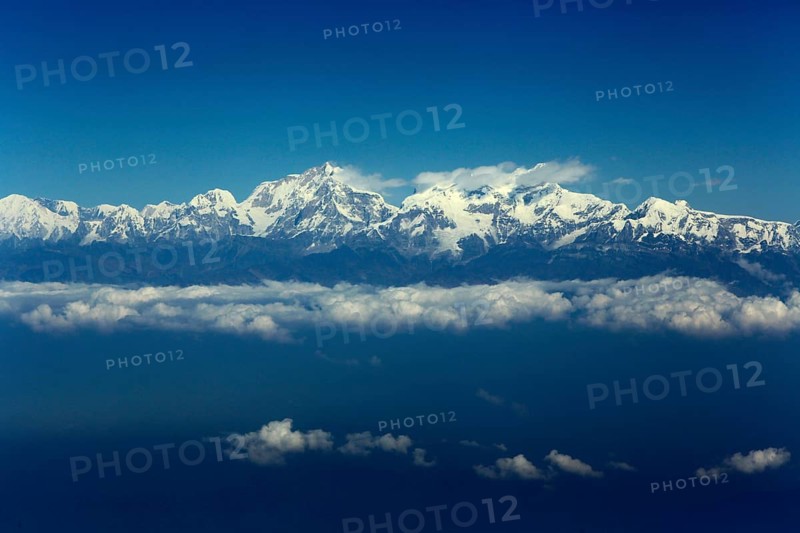 Mountain range of the Himalayas from a plane