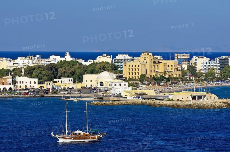Harbour entrance of Rhodes in front of the casino and other buildings