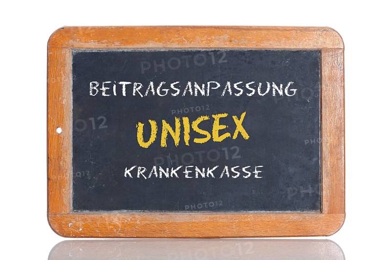 Old school blackboard with the words Beitragsanpassung UNISEX Krankenkasse