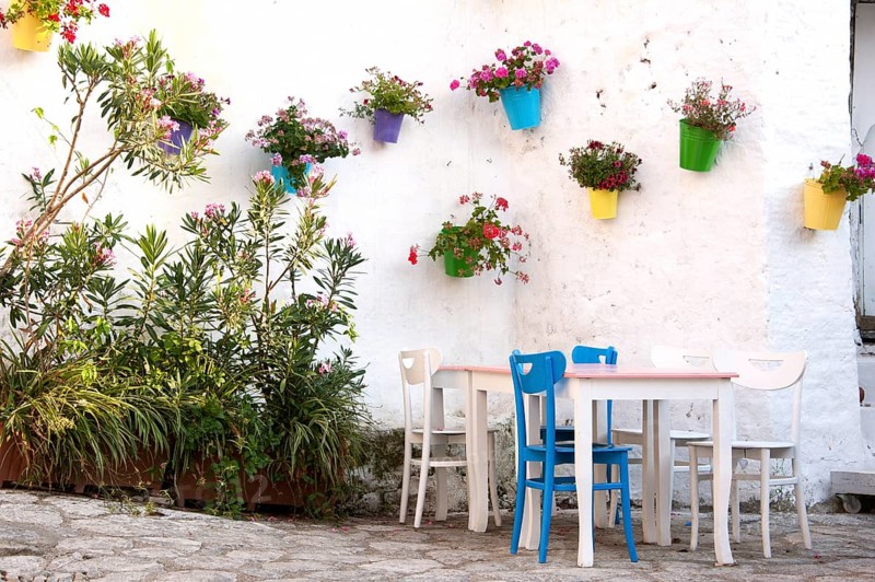 Cafe decorated with flowers on the wall