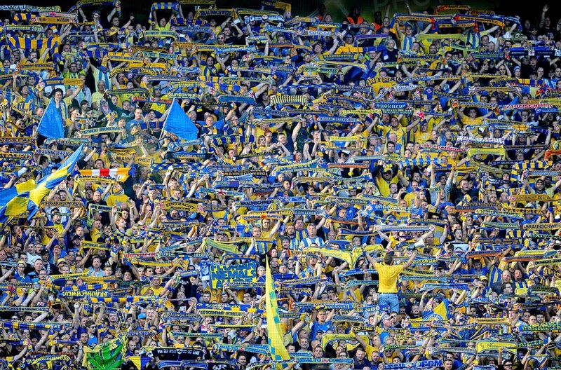 Fans of Eintracht Braunschweig showing their scarves