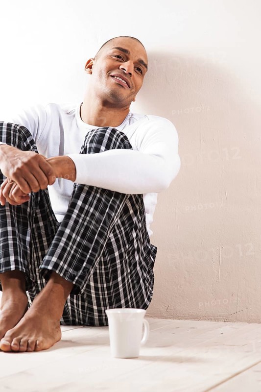 Man sitting comfortably at home