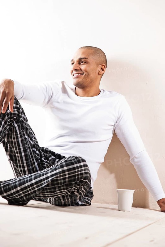 Man sitting comfortably at home