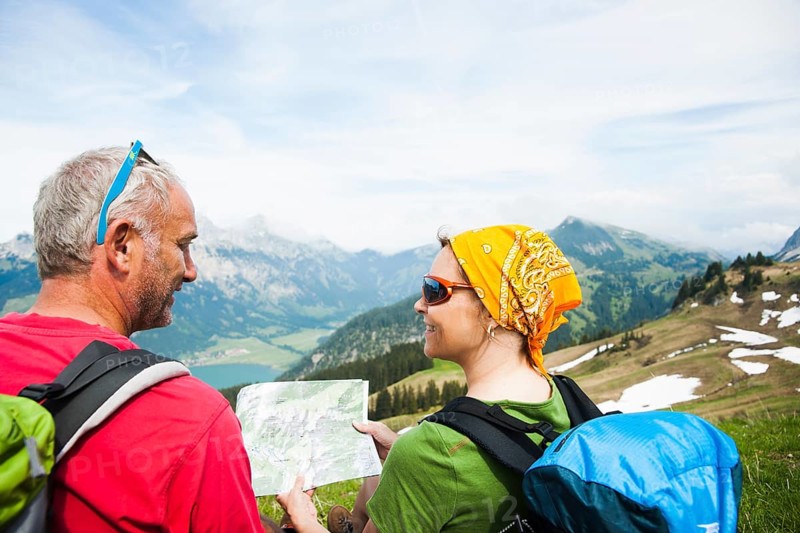 Hiking couple with map