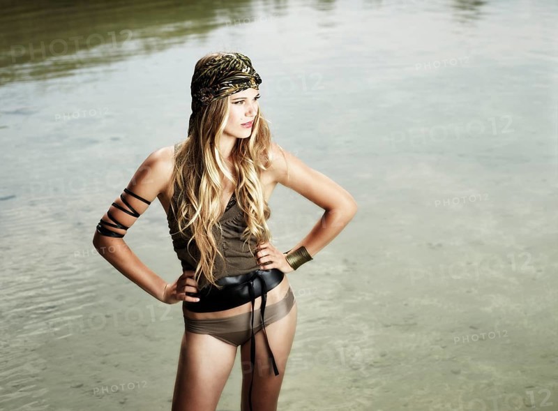 Woman standing in a lake