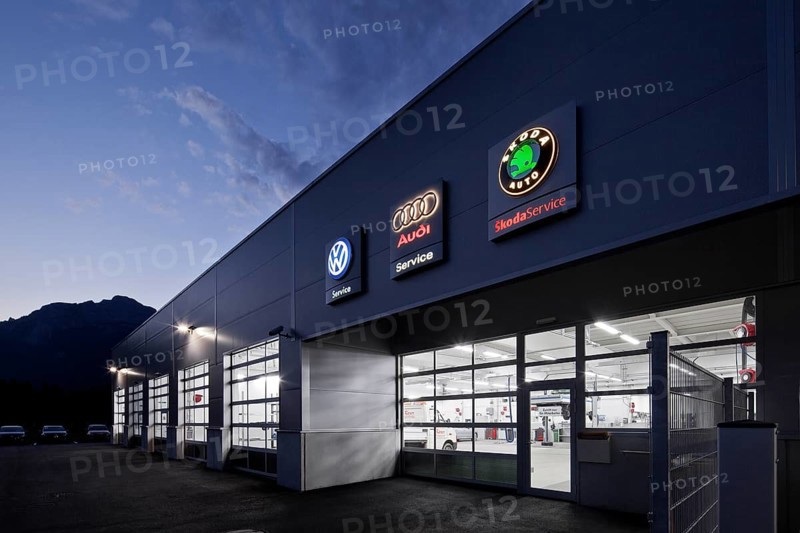 Car repair shop at dusk