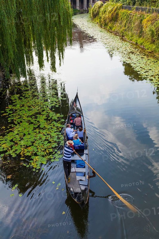 Gondolier in a gondola on the Karl-Heine Canal