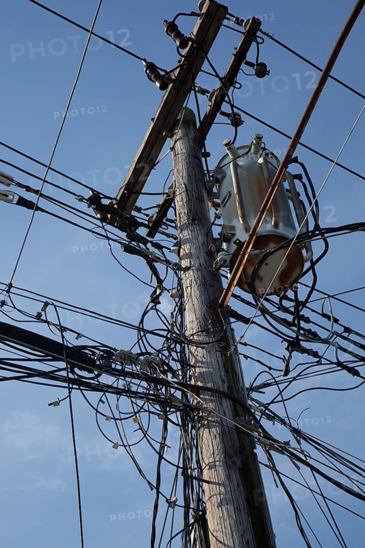 Electrical cables and telephone wires on a power pole