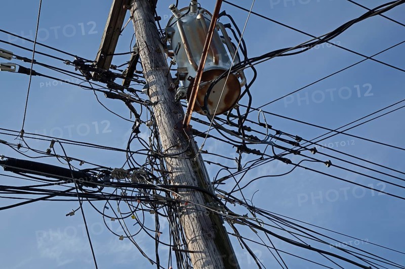 Electrical cables and telephone wires on a power pole